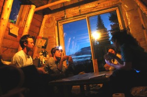 Cam Deamer-Phillips, Danny Marino and Elisa Shapiro playing cards in a cabin in Colorado.  May 2007